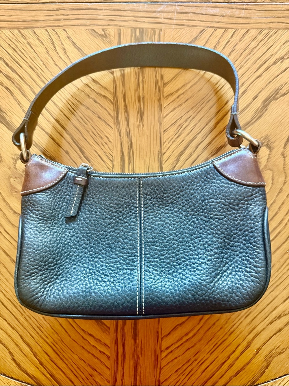 Dooney and Bourke Black Leather Handbag 
Black pebbled leather with brown trim